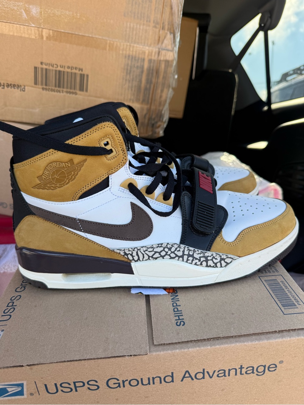 Jordan Men’s Mid-Top Sneakers in White, Black, Brown, Tan